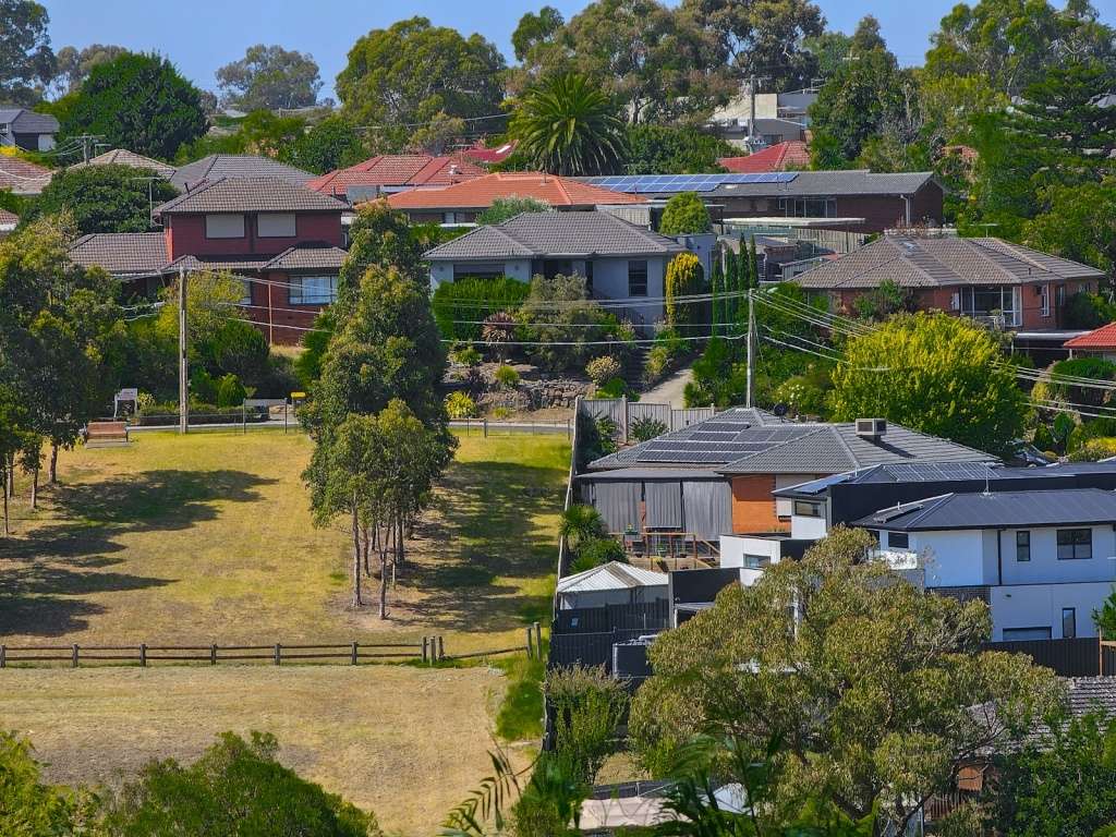 A row of Melbourne houses side by side representing owner-occupier and investor buying